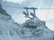 Trucks transported to mountain construction site by cable, Finhaut, Switzerland - Mar 2011