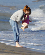 EXCLUSIVE Alyson Hannigan, husband Alexis Denisof and daughter Satyana go to the beach