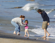 EXCLUSIVE Alyson Hannigan, husband Alexis Denisof and daughter Satyana go to the beach