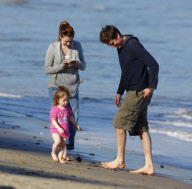 EXCLUSIVE Alyson Hannigan, husband Alexis Denisof and daughter Satyana go to the beach