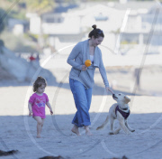 EXCLUSIVE Alyson Hannigan, husband Alexis Denisof and daughter Satyana go to the beach