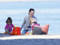 EXCLUSIVE Alyson Hannigan, husband Alexis Denisof and daughter Satyana go to the beach