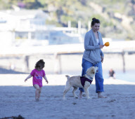 EXCLUSIVE Alyson Hannigan, husband Alexis Denisof and daughter Satyana go to the beach