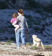 EXCLUSIVE Alyson Hannigan, husband Alexis Denisof and daughter Satyana go to the beach