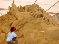 Artists at work at Sandworld indoor sand sculpture park, Weymouth, Dorset, Britain - 06 Apr 2011