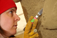 Artists at work at Sandworld indoor sand sculpture park, Weymouth, Dorset, Britain - 06 Apr 2011
