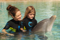 Denise Richards Visits Dolphin Cay at the Atlantis