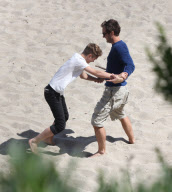 Jude Law and his children hit the beach