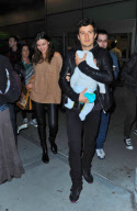 Orlando Bloom, Miranda Kerr and Baby Flynn Land at JFK