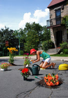 Artists David Luciano and Claudia Ficca turn potholes into works of art, Montreal, Canada - 2009