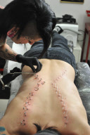 Corset piercing craze sees ribbon 'sewn' onto backs, ribs and thoroats, Southampton, Hampshire, Britain - 3 May 2011