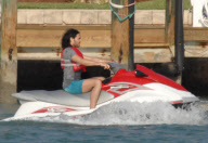 Russell Brand on a wave runner