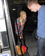 Paris Hilton Pumps Gas Into A Container 