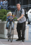 LIEV SCHRIBER AND SON ALEXANDER SPEND THE AFTERNOON TOGETHER BIKING AND PLAYING.