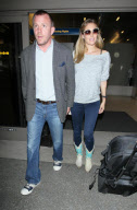 GUY RITCHIE AND JACQUI AINSLEY AT LAX