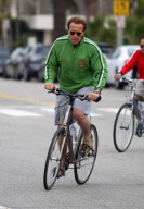 ARNOLD SCHWARZENEGGER taking a bike ride with his buddies as mistresses surface