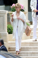 JANE FONDA SHOWS OFF HER AMAZING FIGURE IN A TIGHT WHITE TOP AND HIP-HUGGING WHITE JEANS AT 73(!!) AT  HOTEL DU CAP DURING CANNES FILM FESTIVAL