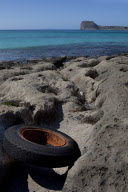 Washed up wheel and tyre, Balos Bay, Crete, Greece