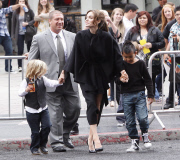Brad Pitt and Angelina Jolie leave Kung Fu Panta, Shiloh Pitt wears a tie