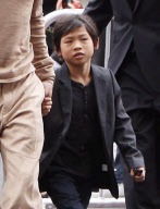 Brad Pitt and Angelina Jolie leave Kung Fu Panta, Shiloh Pitt wears a tie
