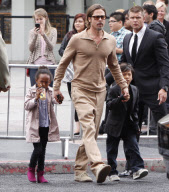 Brad Pitt and Angelina Jolie leave Kung Fu Panta, Shiloh Pitt wears a tie