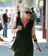 A Very Pregnant Pink Strolls in All Black