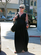 A Very Pregnant Pink Strolls in All Black
