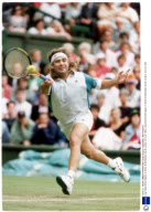 Long-haired Andre Agassi In Action At Wimbledon South London. 23 June 1993.
