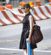 Carey Mulligan Hails a Cab Carrying a Yoga Mat