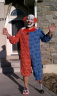 Dale Price waves at his son's school bus dressed in a different costume each morning, American Fork, Utah, America - Jun 2011