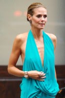 Heidi Klum Leaves her Hotel Wearing a Turquoise Dress