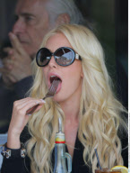HEIDI MONTAG and SPENCER PRATT kissing at a very non private lunch at 'II Pastaio' in Beverly Hills