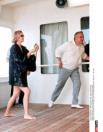 Monaco : Grace and Rainier of Monaco playing dart