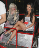 Kim Kardashian and a friend riding a pedicab in NYC