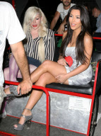 Kim Kardashian and a friend riding a pedicab in NYC