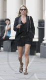 KATE MOSS SHOWS HER LESS THAN SUPERMODEL LEGS IN A PAIR OF SHORTS AS SHE SHOPS IN LONDON