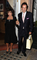 Joan Collins leaving Harry's Bar, London, Britain - 06 Jul 2011
