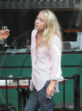 MARY KATE OLSEN WITH A MALE FRIEND SMOKING AND DRINKING OUTSIDE A RESTAURANT IN THE WEST VILLAGE  NEW YORK