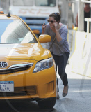 EMMA WATSON GETS ALL FLUSTERED WHILE TRYING TO CATCH A CAB IN NYC. THE ACTRESS EVEN TRIED TAKING OFF HER SUNGLASSES IN HOPES TE DRIVER WOULD RECOGNIZE HER. 
