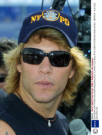 JOHN BON JOVI PROMOTING NEW ALBUM BOUNCE PLAYING FOOTBALL AT NJ GIANTS STADIUM, NEW JERSEY, AMERICA - AUG 2002