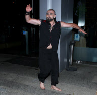 Weston Cage does the splits and martial arts at BOA Steakhouse
