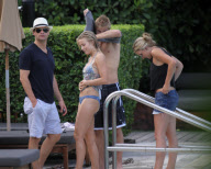 Fresh faced and makeup free 'Dancing with the stars' Julianne Hough takes a quick dip in the ocean before heading poolside to meet up with her boyfriend Ryan Seacrest 