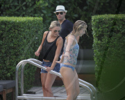 Fresh faced and makeup free 'Dancing with the stars' Julianne Hough takes a quick dip in the ocean before heading poolside to meet up with her boyfriend Ryan Seacrest 