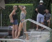 Fresh faced and makeup free 'Dancing with the stars' Julianne Hough takes a quick dip in the ocean before heading poolside to meet up with her boyfriend Ryan Seacrest 