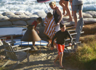 EXCLUSIVE... David Beckham Boogy Boards Malibu With His Boys