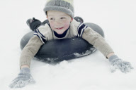 Boy playing in snow