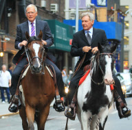 Harrison Ford and David Letterman ride horses down a midtown street in NYC