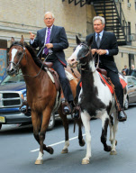 Harrison Ford and David Letterman ride horses down a midtown street in NYC