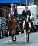 Harrison Ford and David Letterman ride horses down a midtown street in NYC