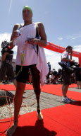 GB Swimmer Keri-Anne Payne wins gold medal in the 10k open water event at the Fina World Championships in Shanghai to seal her spot at the 2012 Olympics